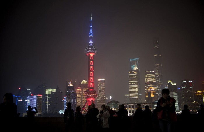 The Oriental Pearl TV Tower (C), Lujiazui Financial District in Pudong, AFP PHOTO / JOHANNES EISELE